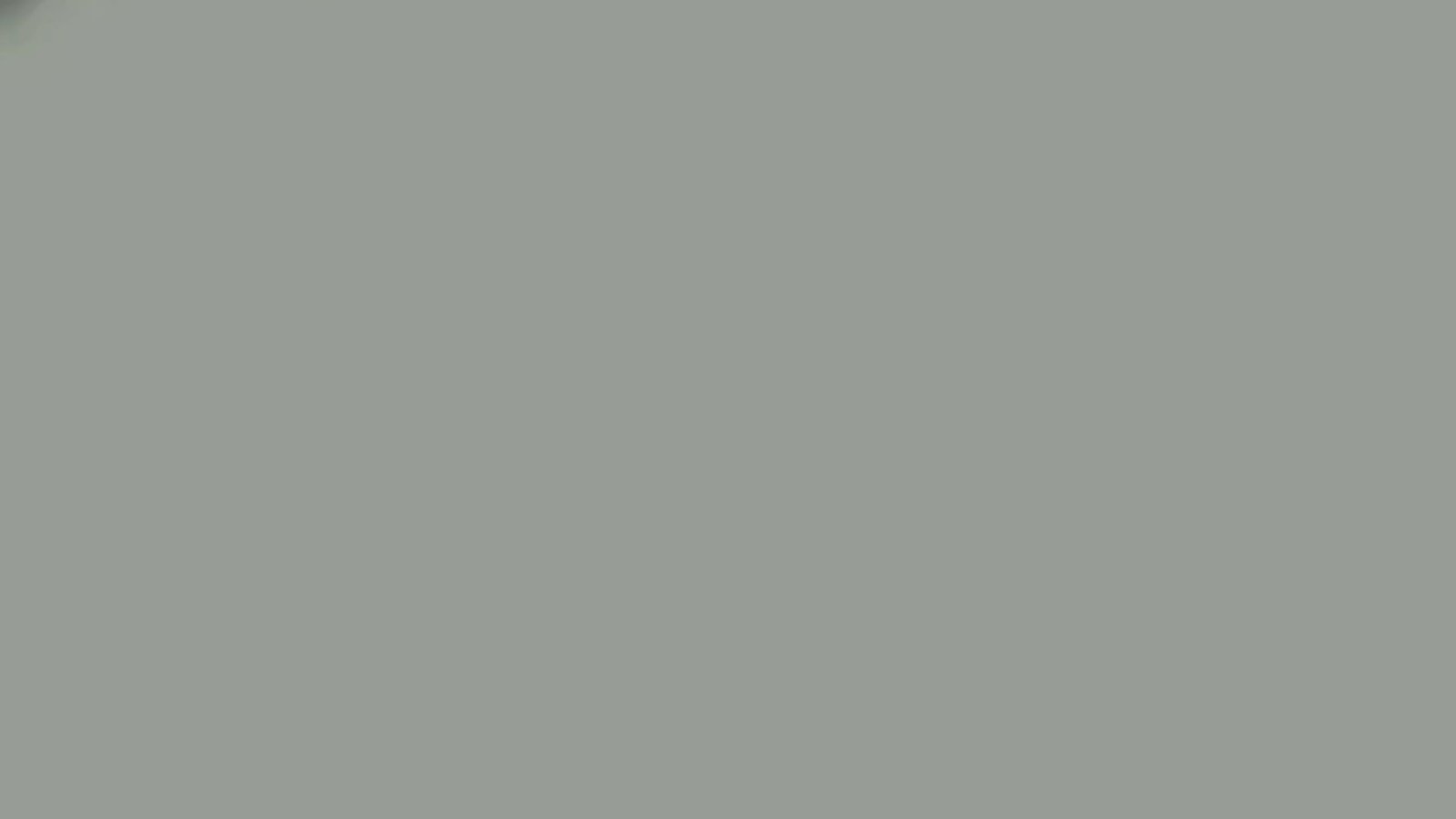 A smooth, light gray textured surface fills the image, evoking a calm and minimalist ambiance. The monochromatic tone suggests simplicity and modern design.